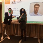 Dr. Daniele Mazzarella, former PhD student in the Melchiorre group receving the 2nd prize of the Reaxys-SCI Early Career Researcher Award from ICIQ alumna Dr. Giulia Moncelsi, former PhD student in the Ballester group during the Merk Young Chemist Symposium organized by the SCI.